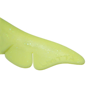 Yellow rubber glove with glitter on a white background