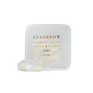 CiaoBrow Orbit C Curl professional brow and lash system, featuring a clear plastic case with gold lettering and a single clear curled lash strip in front, set against a solid white background.